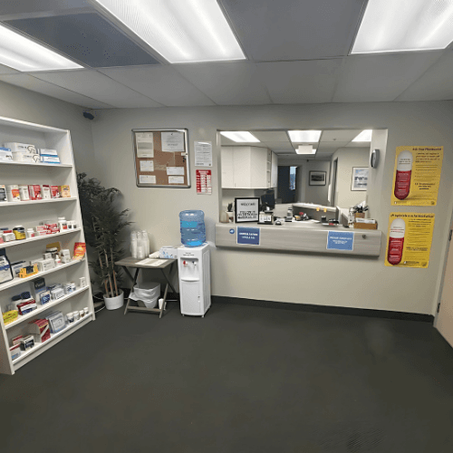 pharmacist greeting a patient inside MedPlus Pharmacy